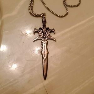 Necklace with knife charm